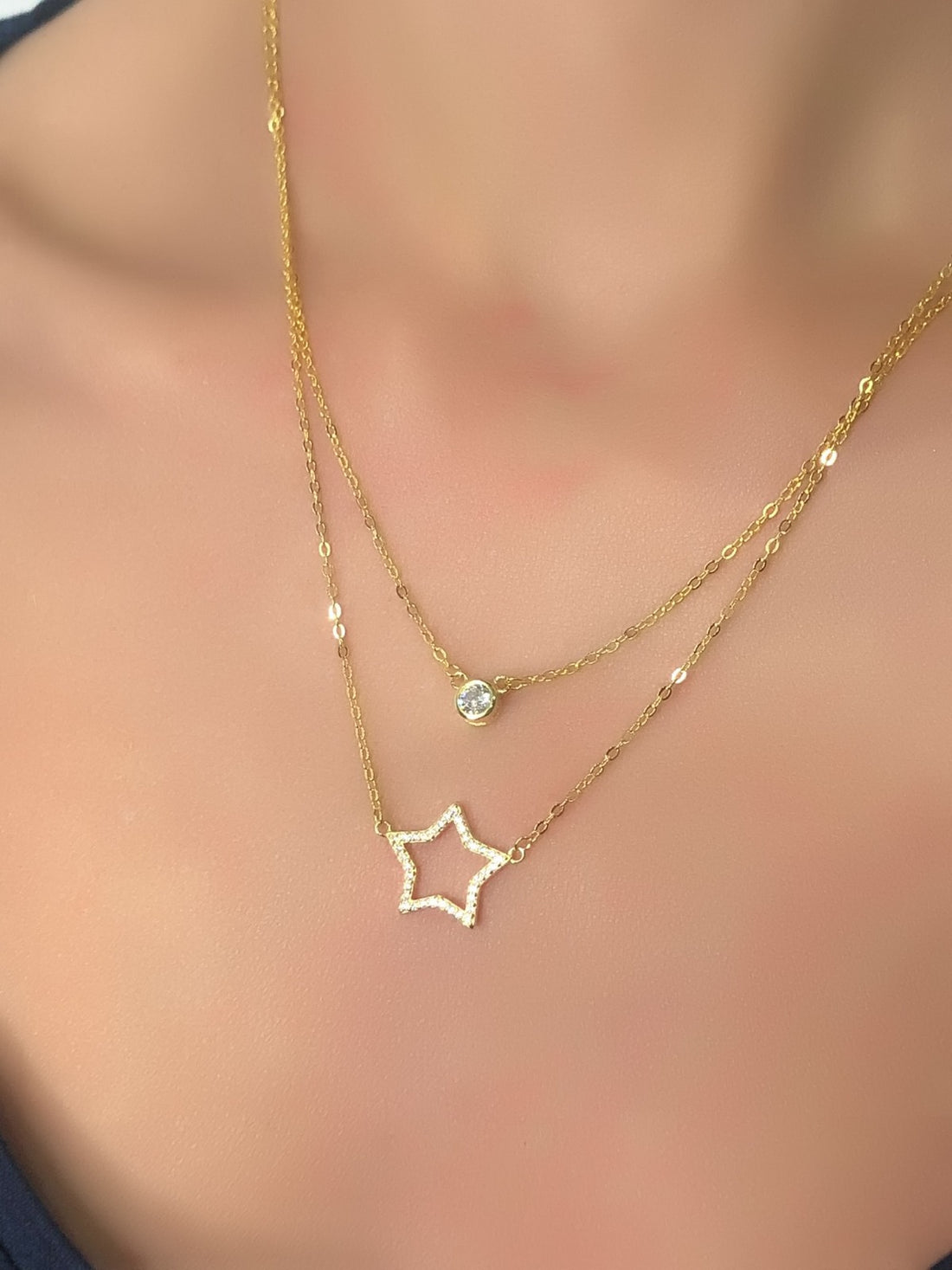 Collana con due fili con stella e punto luce