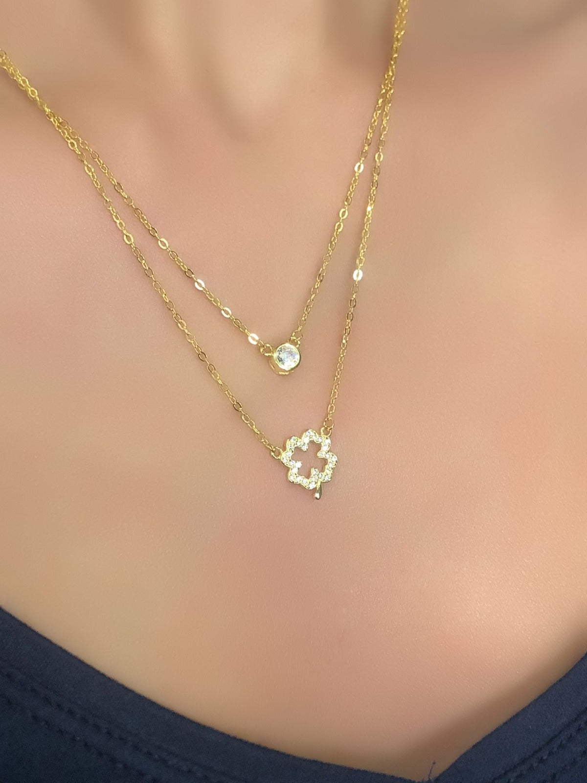 Collana con due fili con quadrifoglio e punto luce