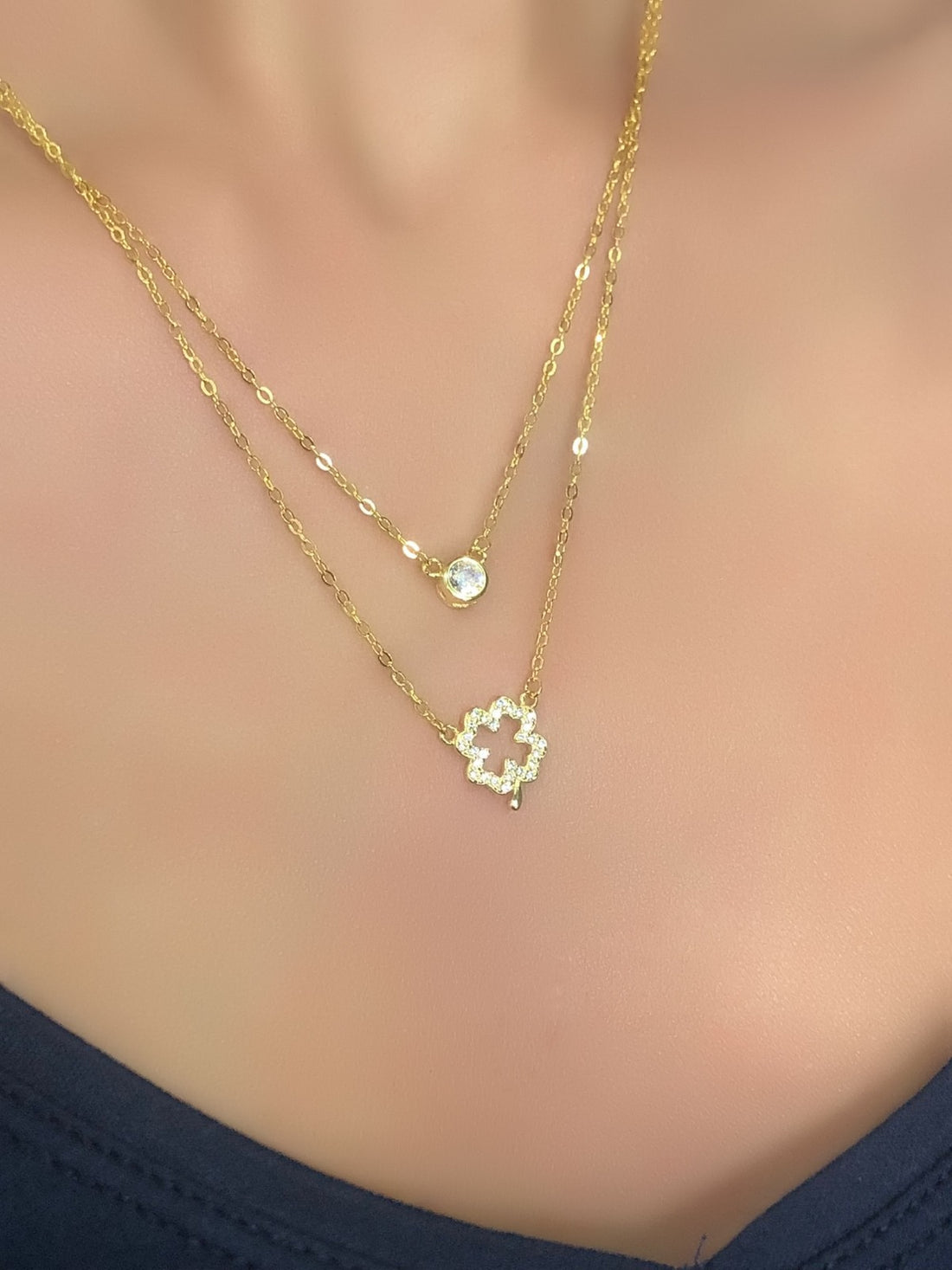 Collana con due fili con quadrifoglio e punto luce