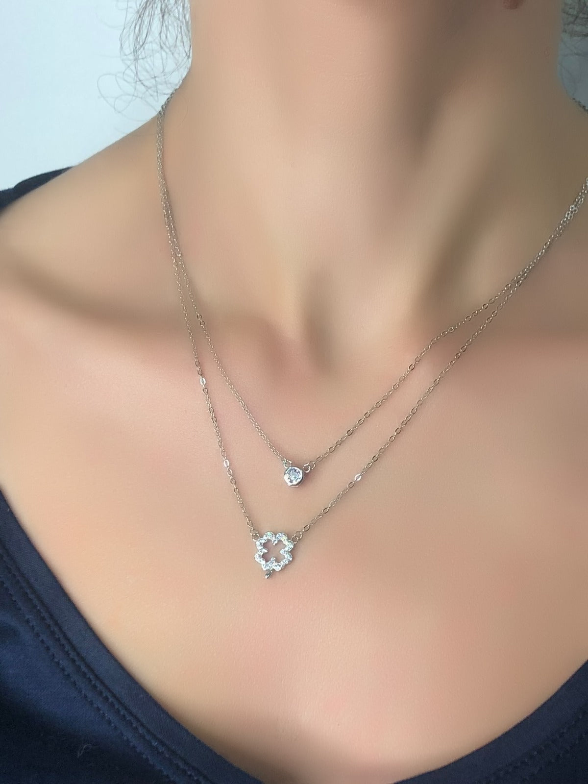 Collana con due fili con quadrifoglio e punto luce