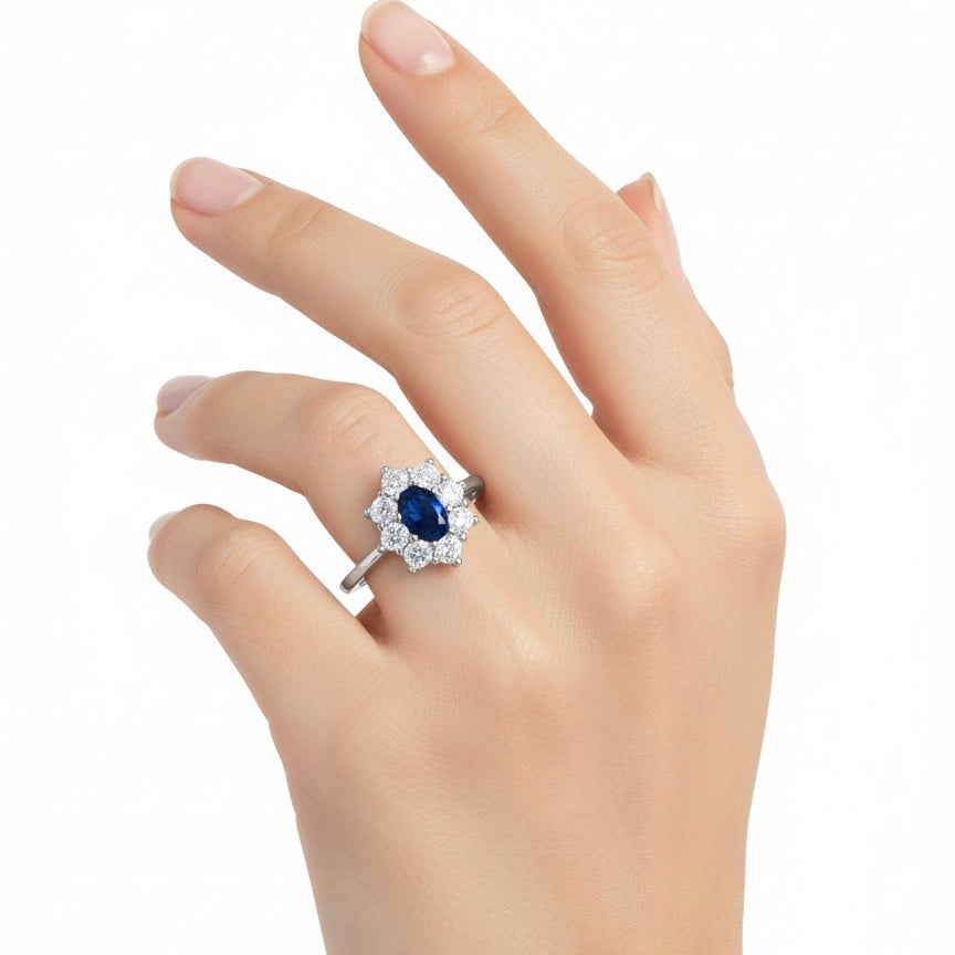 Anello kate fiore con pietra blu e zirconi bianchi