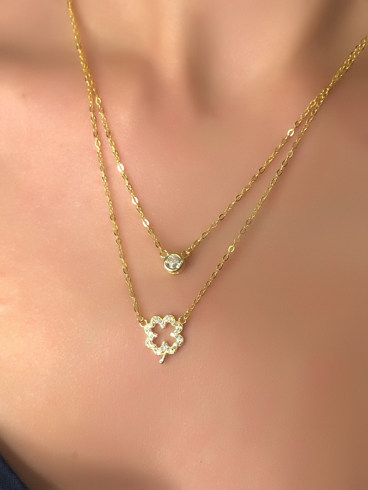 Collana con due fili con quadrifoglio e punto luce