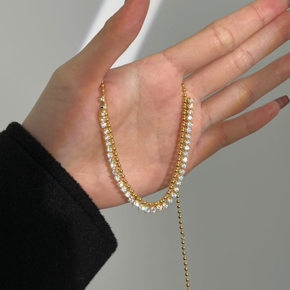 Collana pallina con punti luce