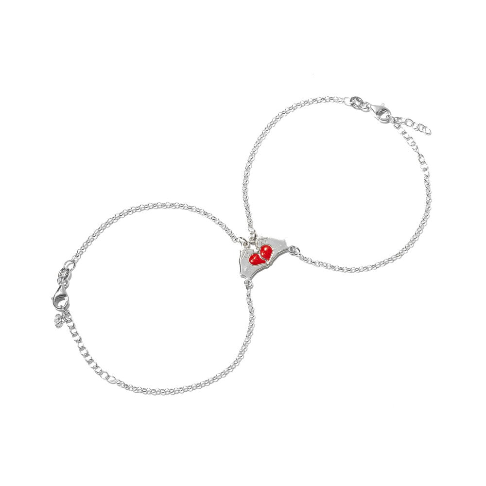 Bracciale divisibile con mani e cuore rosso