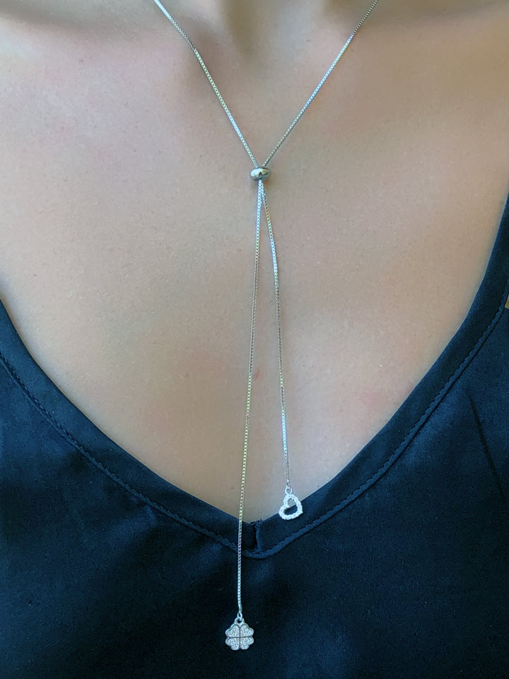 Collana saliscendi con cuore e quadrifoglio