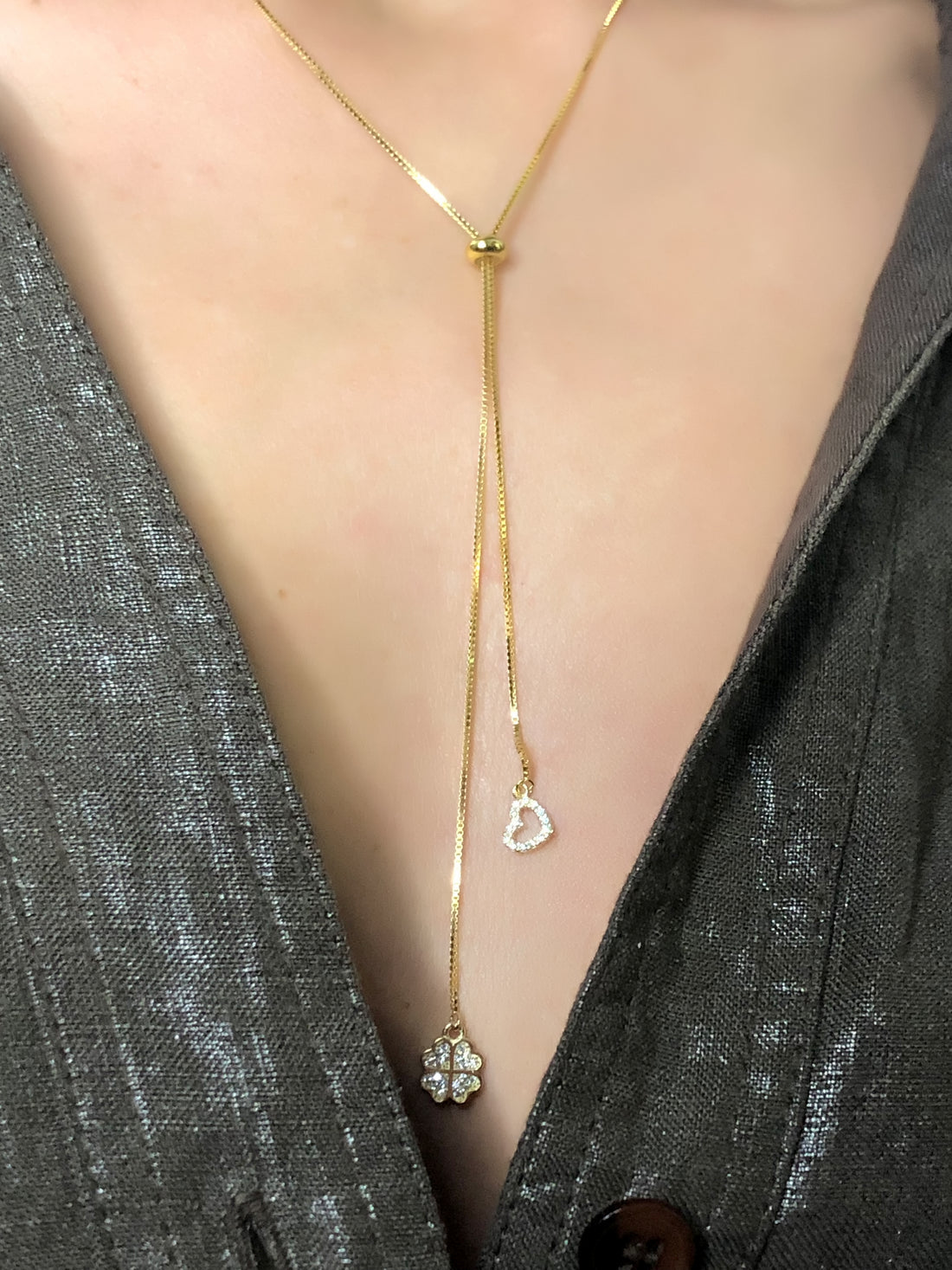 Collana saliscendi con cuore e quadrifoglio